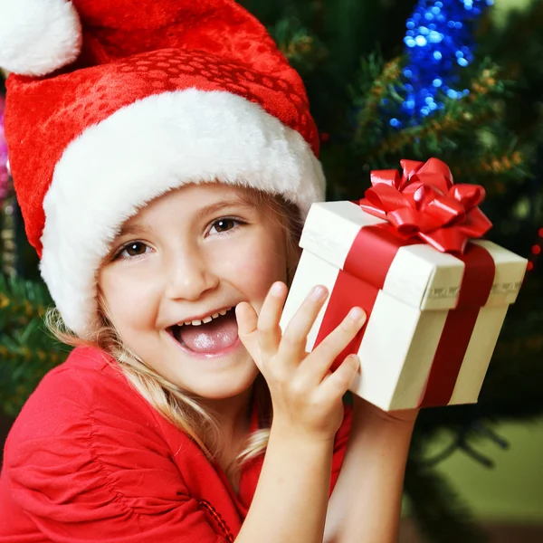 Menina em santa cap — Fotografia de Stock