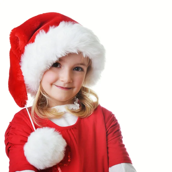 Noel Baba şapkalı küçük kız — Stok fotoğraf
