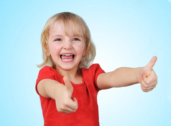 Ragazza gesticolando pollici verso l'alto — Foto Stock