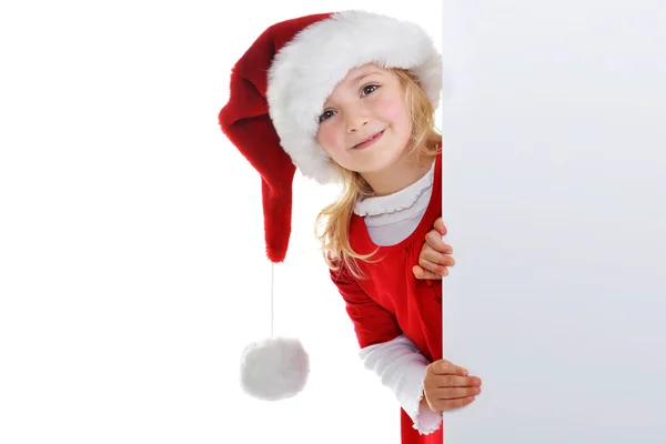 Bambina in cappello di Babbo Natale — Foto Stock