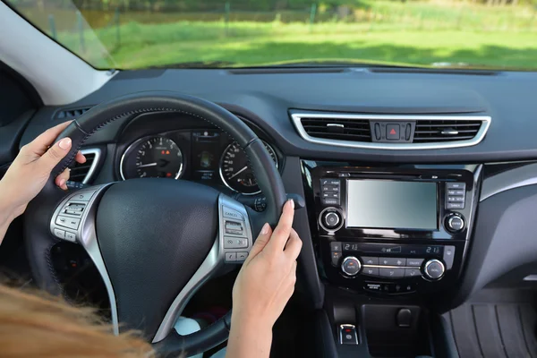 Female hands of steering wheel — Stock Photo, Image