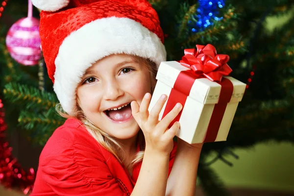 Little girl in santa cap — Stock Photo, Image