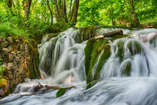 Beautiful waterfalls on slopes — Stock Photo, Image