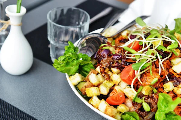Tasty salad on plate — Stock Photo, Image