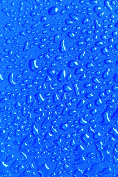 Gotas de água em azul — Fotografia de Stock