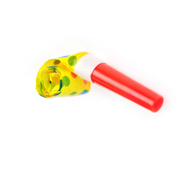 Red and yellow birthday whistle — Stock Photo, Image