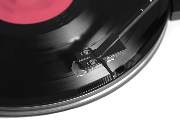 Rotation vinyl record with red label top view — Stock Photo, Image