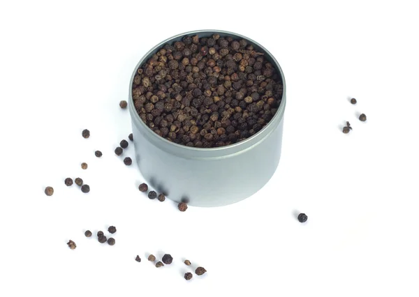 Black pepper in metal spice jar — Stock Photo, Image