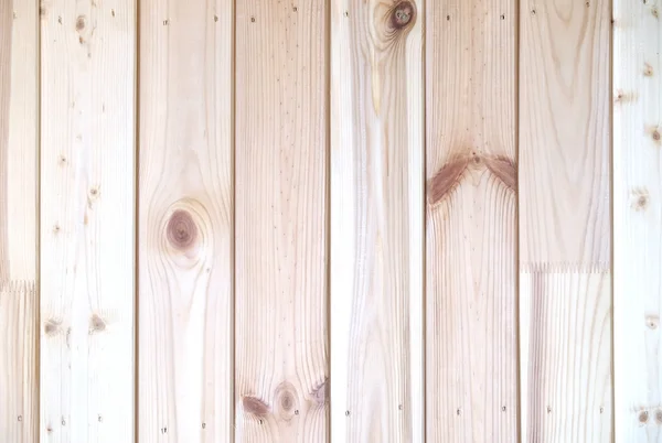 Stěna ze svislých dřevěných prken jako pozadí — Stock fotografie