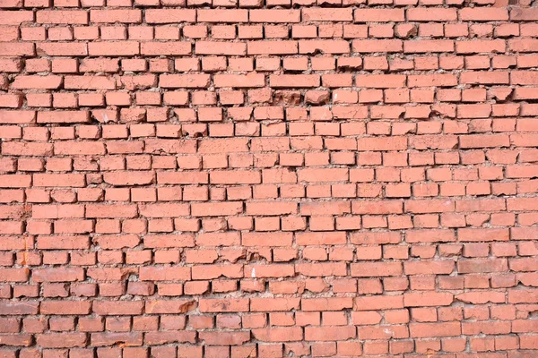 Wall of red bricks front view closeup — Stock Photo, Image