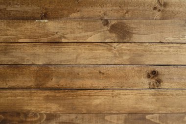 Geçmişe dönük kahverengi renkli ahşap desenli tahtalar arka plan ön görünümü yatay yakın plan