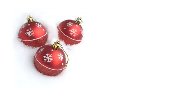 Carte postale de Noël avec trois boules de jouets rouges — Photo