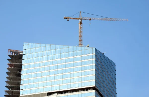 Skyscraper building construction in process — Stock Photo, Image