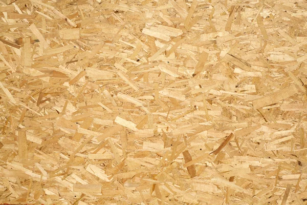 Houten paneel gemaakt van geperst hout krullen — Stockfoto