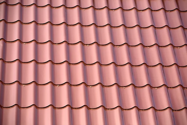 Part of red metal roof as background — Stock Photo, Image