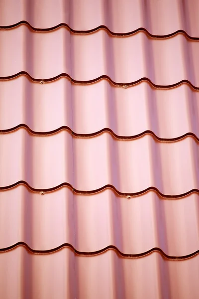 Part of red metal roof as background — Stock Photo, Image