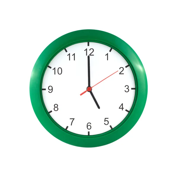 П'ять годин на зеленому годиннику стіни — стокове фото
