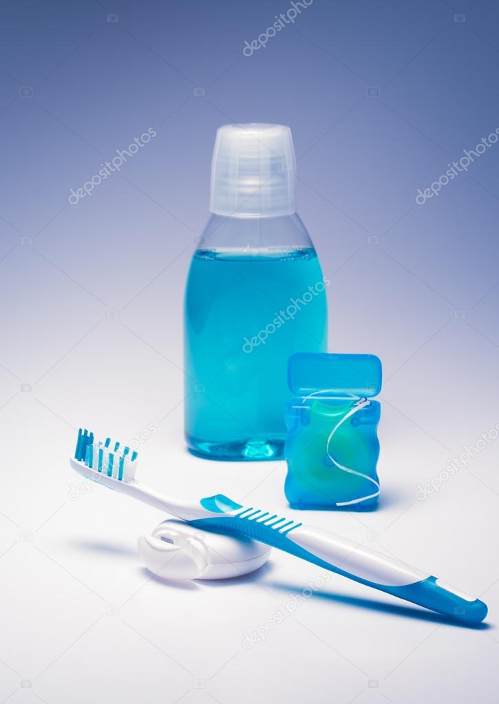 dental floss, tooth brush and mouth rinse