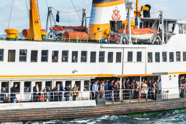 People get on board the ship at Karakoy Pier  in Istanbul. Nearly 150,000 passengers use ferries daily in Istanbul, due to easy access to two different continents.