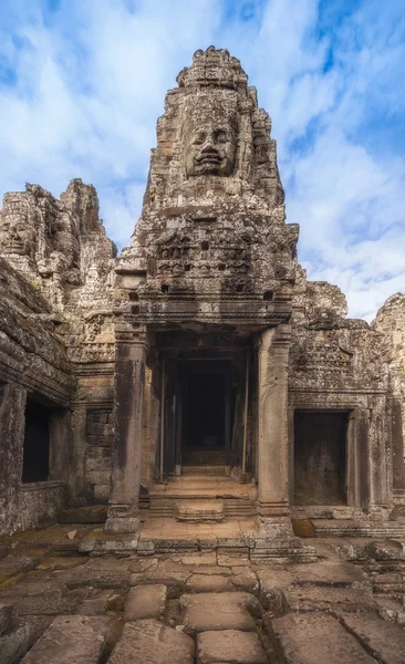 SIEM REAP, CAMBODIA. December 16, 2011. Ancient stone faces of Bayon temple, Angkor Thom. — Stock Photo, Image