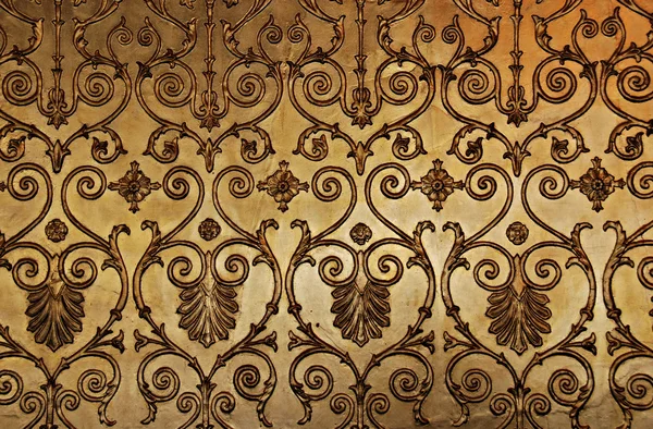 Golden wall, Gammal dekorativ prydnad, antik inredning Stockbild