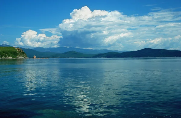 Cloudscape, Παραθαλασσίας, θάλασσα της Ιαπωνίας, τοπίο ωκεανού, όμορφη Θαλασσογραφία Royalty Free Εικόνες Αρχείου