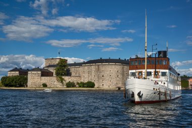 Vaxholm Fortress on Vaxholm island, part of the Stockholm archipelago,  Stockholm County, Sweden. clipart