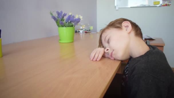 Young Boy Sleeps Table Wakes Abruptly — Stock Video