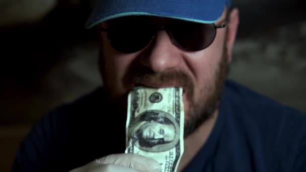 Man Eating Dollar Bill — Stock Video