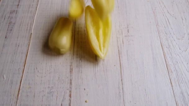 Halves Bell Pepper Fall Wooden Surface Slow Motion — Stock Video