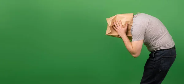 Unrecognizable Man Paper Bag His Head Grabbed His Head Green — Stock Photo, Image