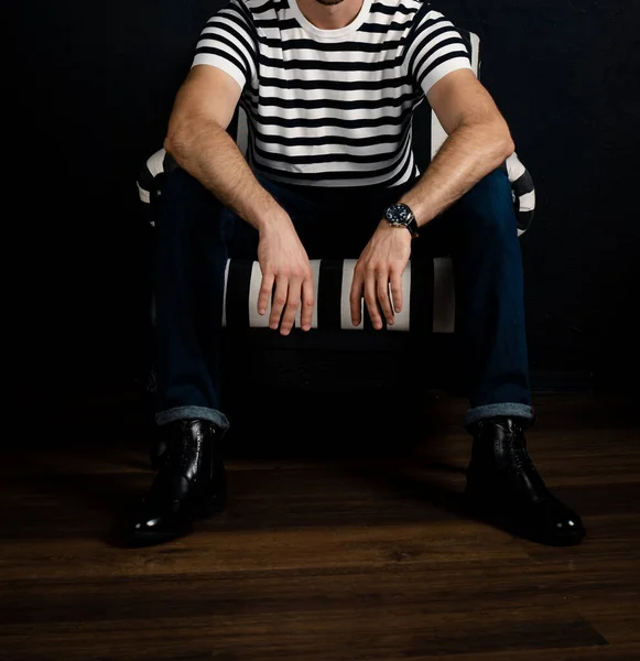 Unrecognizable Man Striped Shirt Sits Striped Armchair — Stock Photo, Image