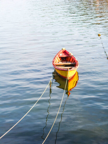 Small fishing boats, moored on the coast of the Valdivia River, in the town of Corral. Chile is a power in extractive fishing in the world. Southern Chile.