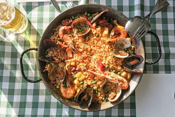 seafood paella in traditional pan