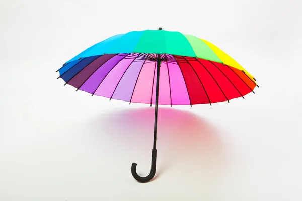 Multicolored umbrella on white background — Stock Photo, Image