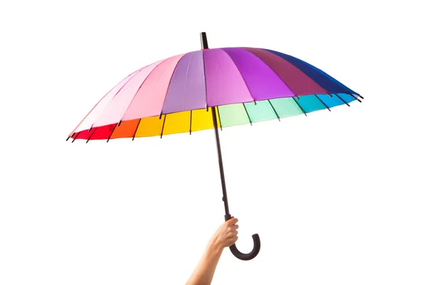 Ręki trzymającej parasol wielobarwny, na białym tle — Zdjęcie stockowe