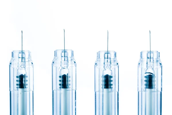 Injekční stříkačky izolovaných na bílém — Stock fotografie