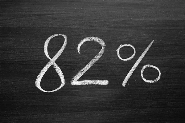 82 percent header written with a chalk on the blackboard — Stock Photo, Image