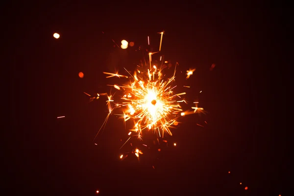 Chispa de Navidad en neblina con luz roja —  Fotos de Stock