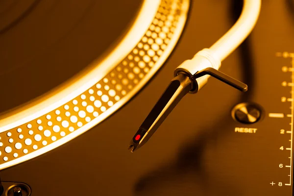 Turntable headshell and platter dots, golden tone — Stock Photo, Image