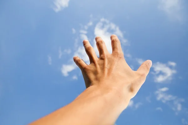 Ręka dotknąć nieba — Zdjęcie stockowe