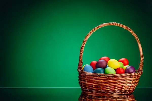 Easter Color Eggs Festive Gift Basket Green Background Copy Space — Stock Photo, Image