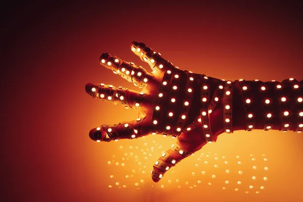 Человеческая Рука Покрытая Оранжевым Светом Освещенным Фоном — стоковое фото