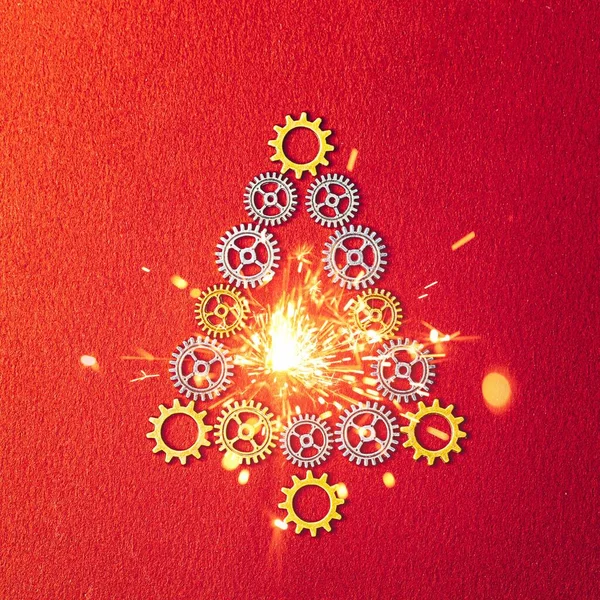 红色纹理背景上闪烁着火花的圣诞树齿轮 — 图库照片