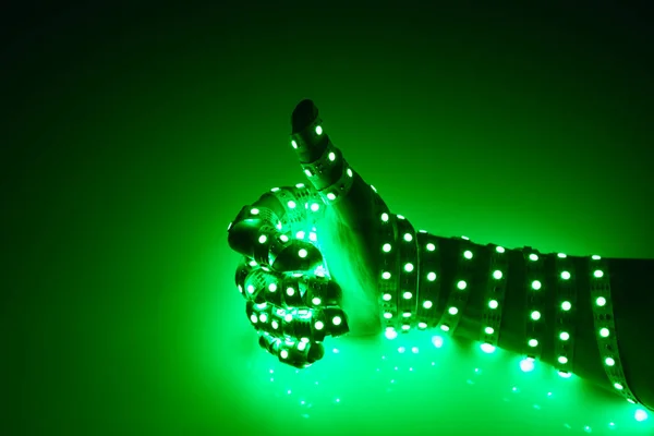 Большие Пальцы Вверх Руки Покрытые Зеленым Светом Освещенный Фон — стоковое фото
