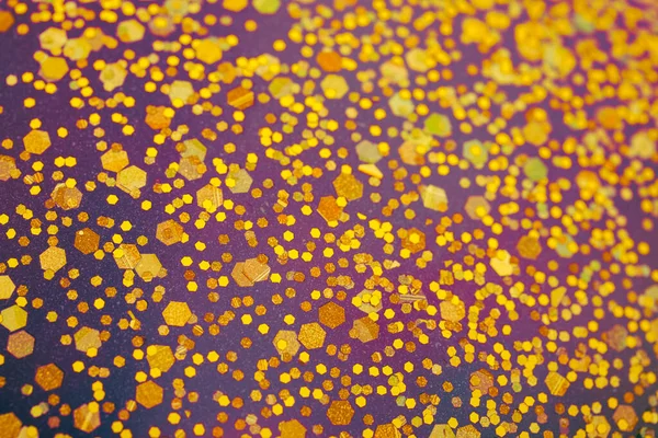 お祝いの輝きの背景黄金の箔粒子 — ストック写真