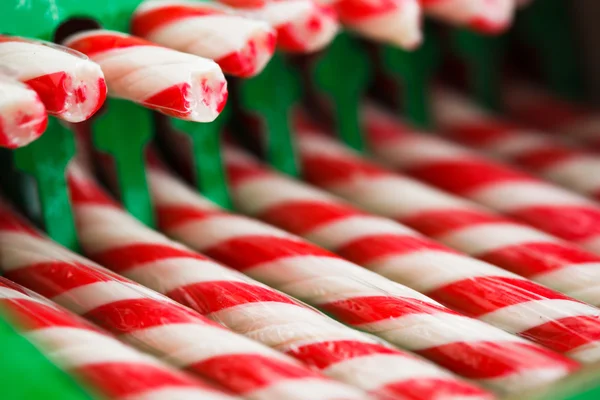 Zuckerstangen in grüner Verpackung — Stockfoto