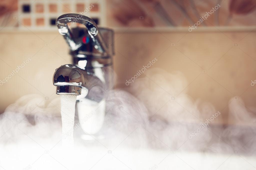 Water tap with hot water steam Stock Photo by ©nikkytok 55457051
