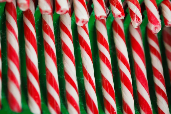 Zuckerstangen in grüner Verpackung — Stockfoto