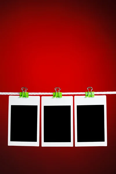 Blank photos on red background — Stock Photo, Image
